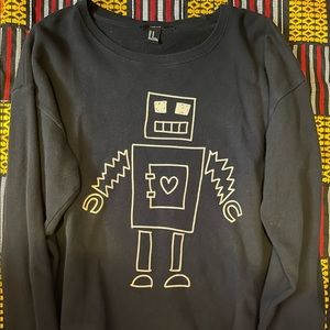 Forever 21 black sweater with a love robot on the front.